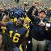 Michigan quarterback Denard Robinson, left, and head coach Rich Rodriguez, right, join the rest of the team in singing "Hail to the Victors" in front of the student section following the Wolverine's 30-10 win over the UConn Huskies in Saturday, September 4th's season opener between the two teams at Michigan Stadium.
Lon Horwedel | AnnArbor.com